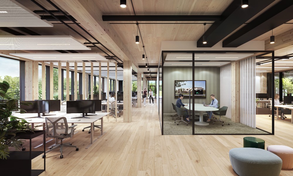 Bürobauten aus Holz schaffen eine Atmosphäre, in der Menschen gern arbeiten. Abbildungen: Woods (Renderings)